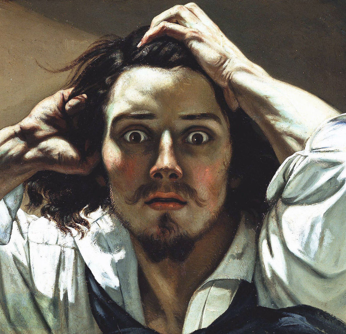 Selfie of a shocked man.